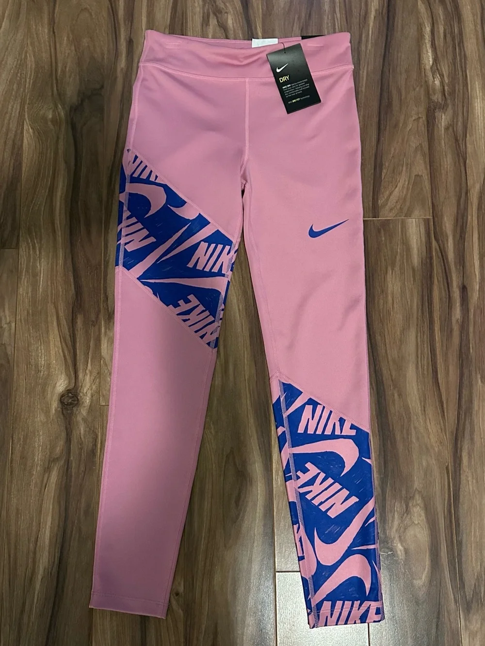 Nike Pink Leggings with Blue Graphic Accents